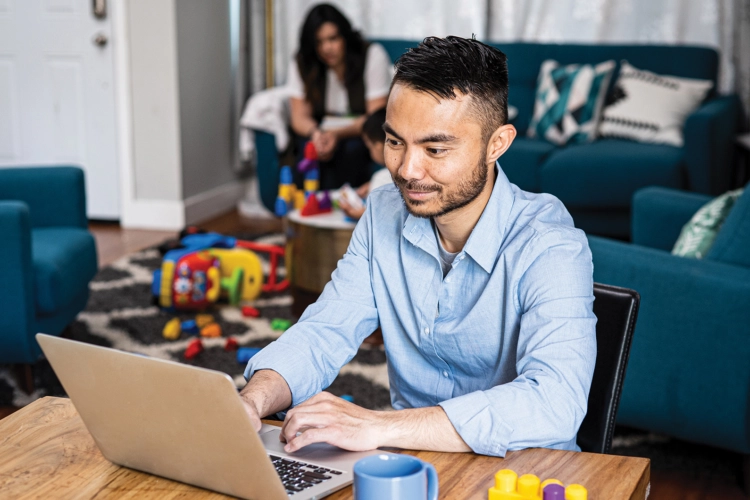Man at home on computer