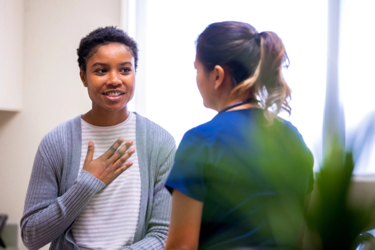 Nurse and patient having a discussion