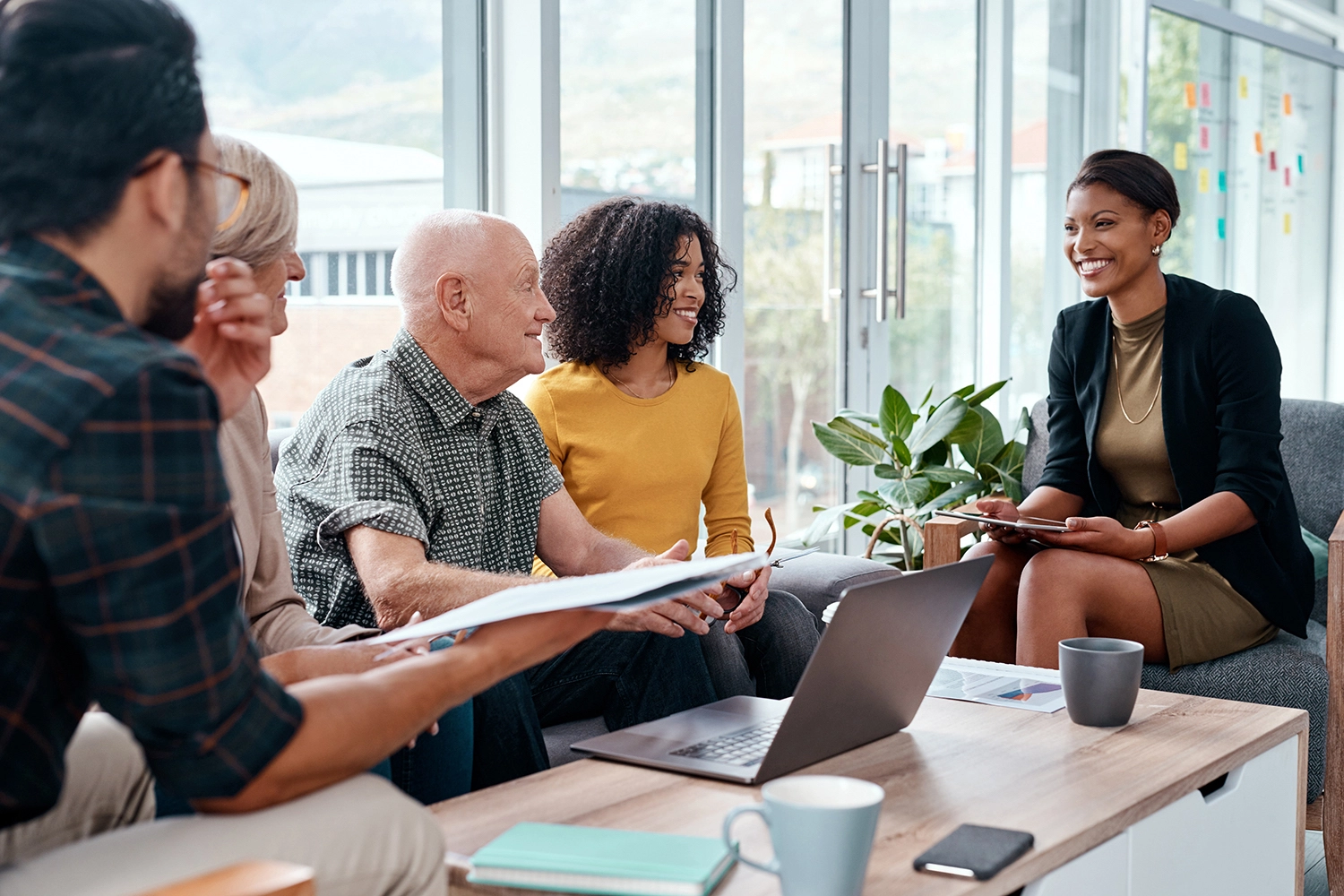 Shot of a group of businesspeople having a discussion in an office