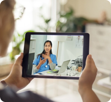 person using ipad for procedural intervention
