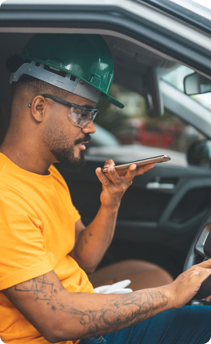 Construction worker on his phone