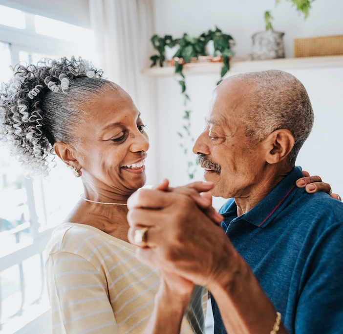 couple dancing in their kitchen