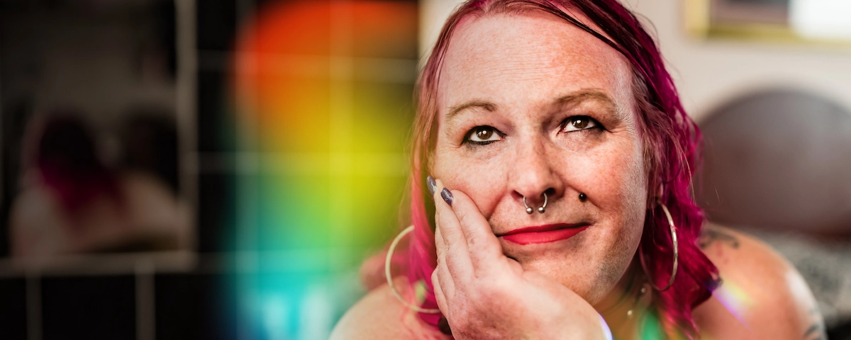 LGBTQ+ person smiling