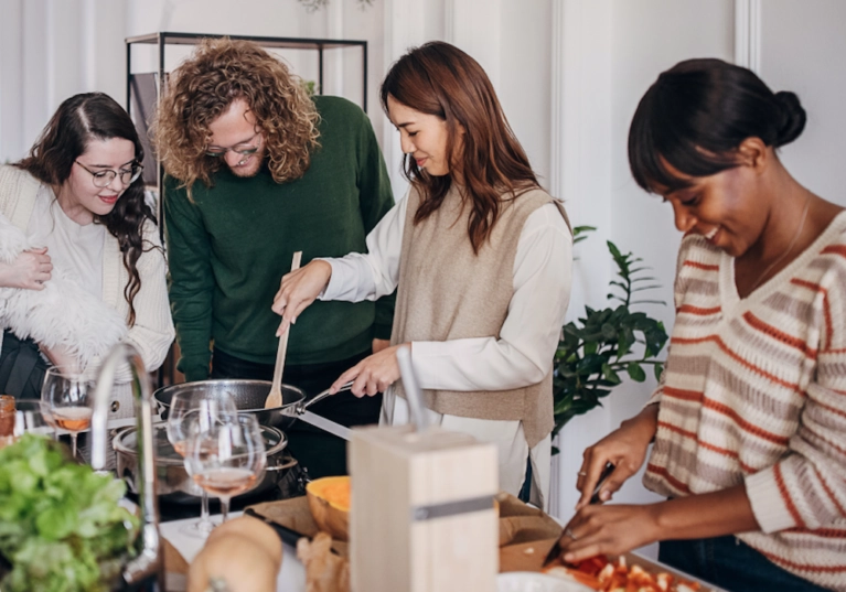 group of friends making a holiday dinner