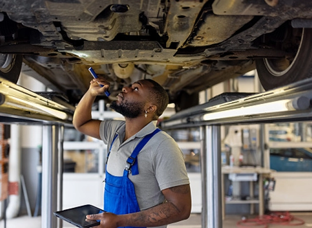 Man working on automobile