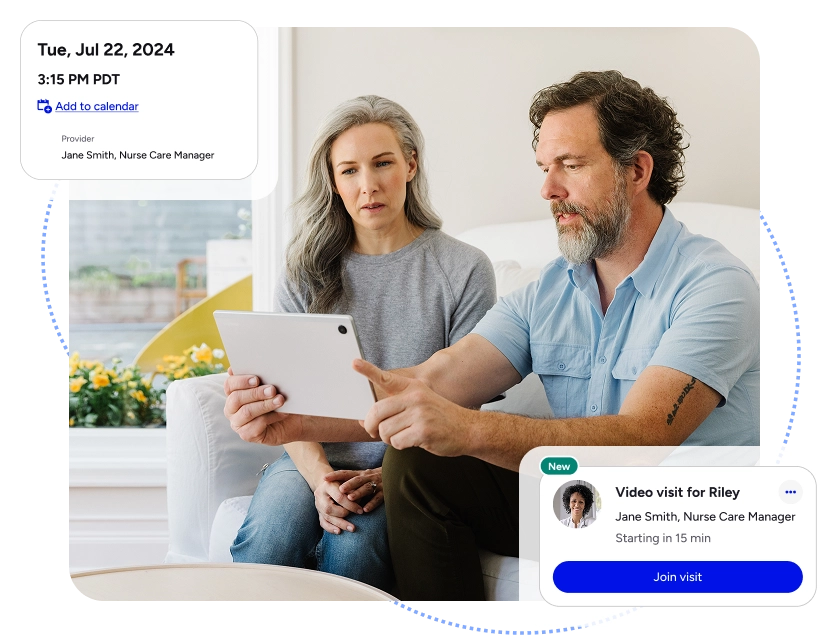 Middle aged couple sitting on the couch asking questions about their treatment with their nurse care manager.