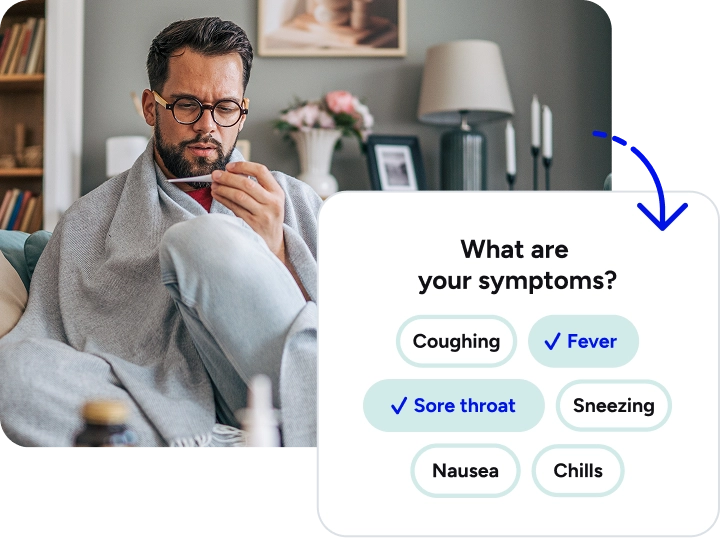 Man in a robe looking at a thermometer