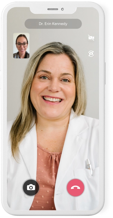 Female doctor speaking with a patient on the Included Health app