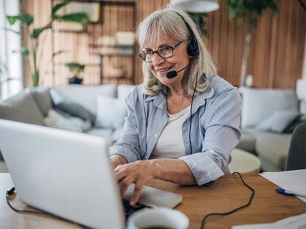 Care team advocate on the phone talking to a member about confusing medical language.