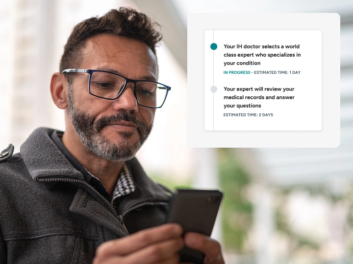 Man looking at Included Health app