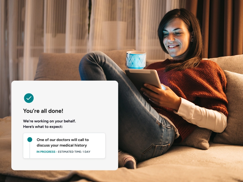 Woman looking at the Included Health app.