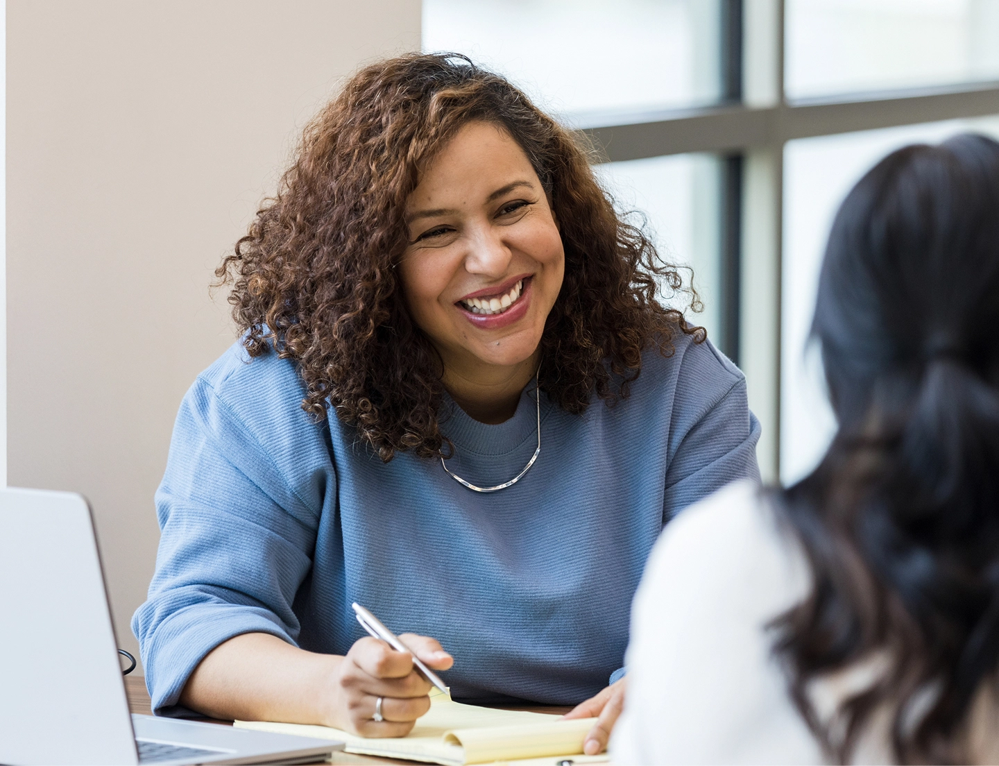 Similing woman in consultation situation