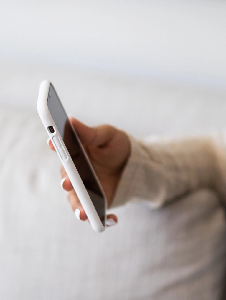 close-up of hand and smartphone
