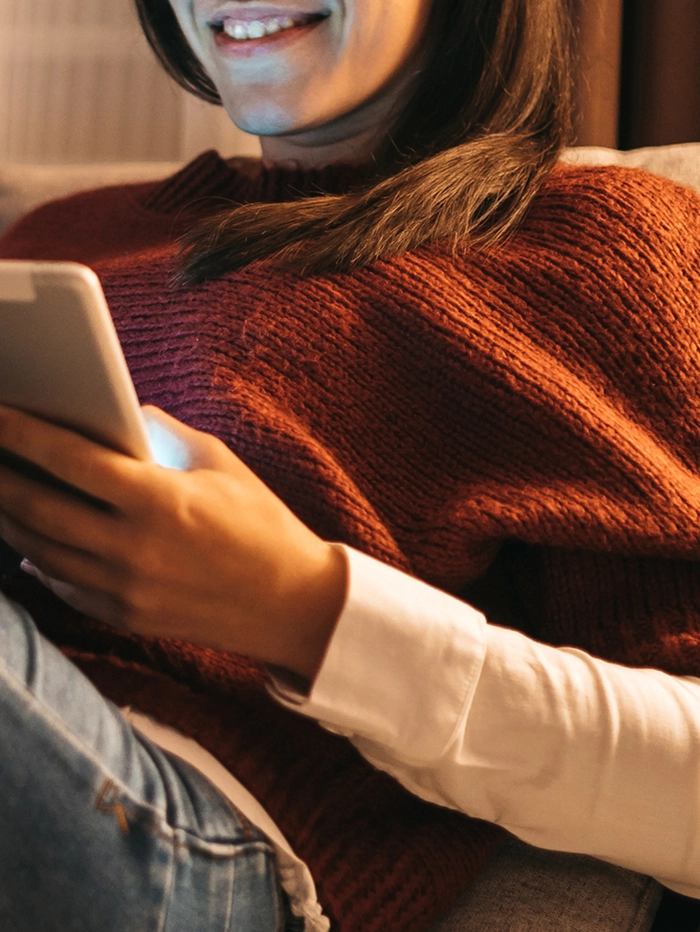 woman looking at smartphone
