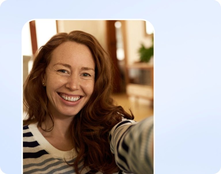 Smiling woman in smartphone background