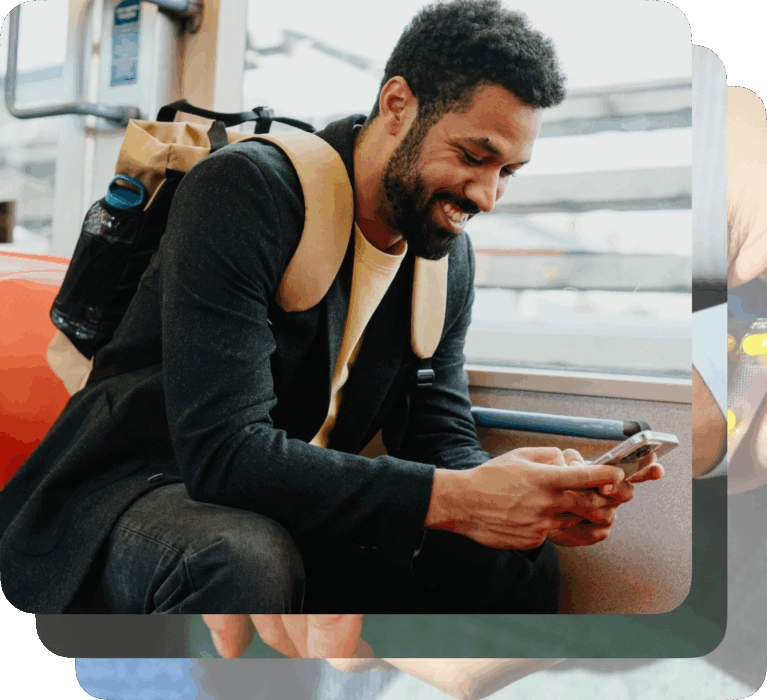Smiling man with a backpack on a public transit bus looking at his smartphone. An overlay menu shows healthcare options: Virtual care, Care advice, Search for local care, Insurance and billing, and View all services.