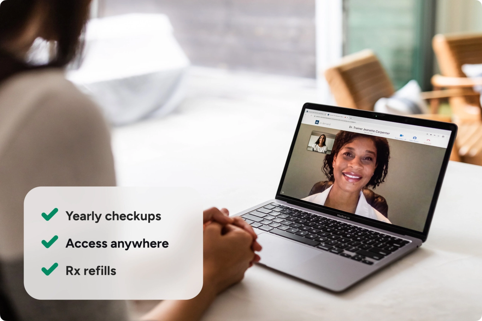 A woman speaking with her doctor on a video call.